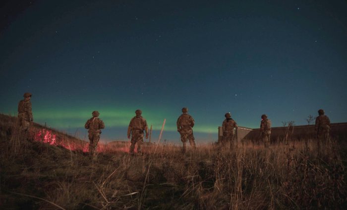 Members of the 137th Mission Sustainment Team conduct an unexploded ordnance sweep during U.S. Special Operations Command Europe led ATREUS 22-4 at Andøya Space Defense Range, Norway, Nov. 8, 2022. This was the first time the multi-capable Airmen conducted their mission in a setting realistic to the austere environments they will encounter while supporting global SOF operations. (U.S. Air National Guard photo by Tech. Sgt. Brigette Waltermire)